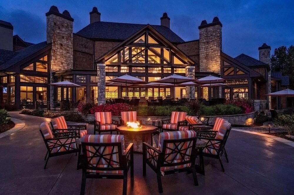 Lakeside clubhouse in the community at dusk