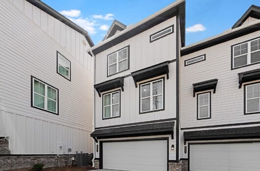 Townhomes with two-car garages in the community