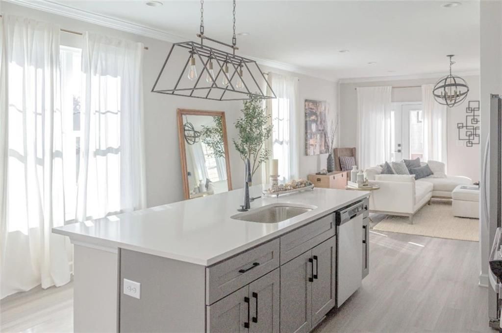 Kitchen and living room of a new townhome in Hollywood & Main II, Atlanta