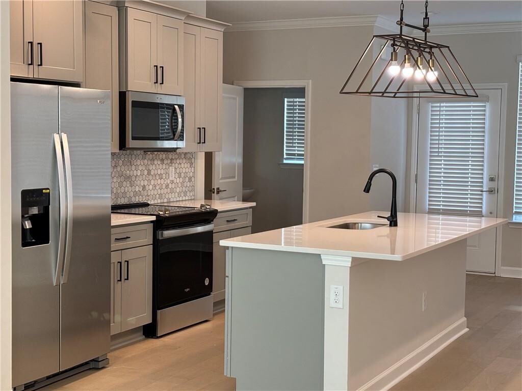Kitchen with stainless steel appliances