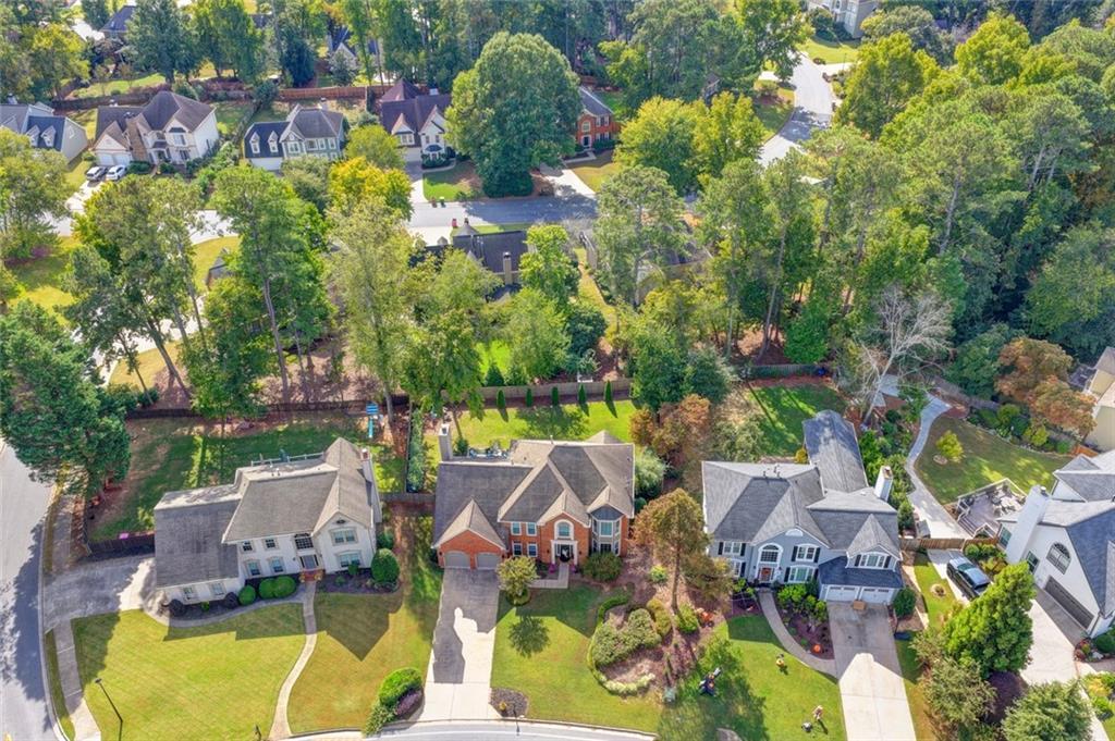 Aerial view of Windgate streets and mature trees